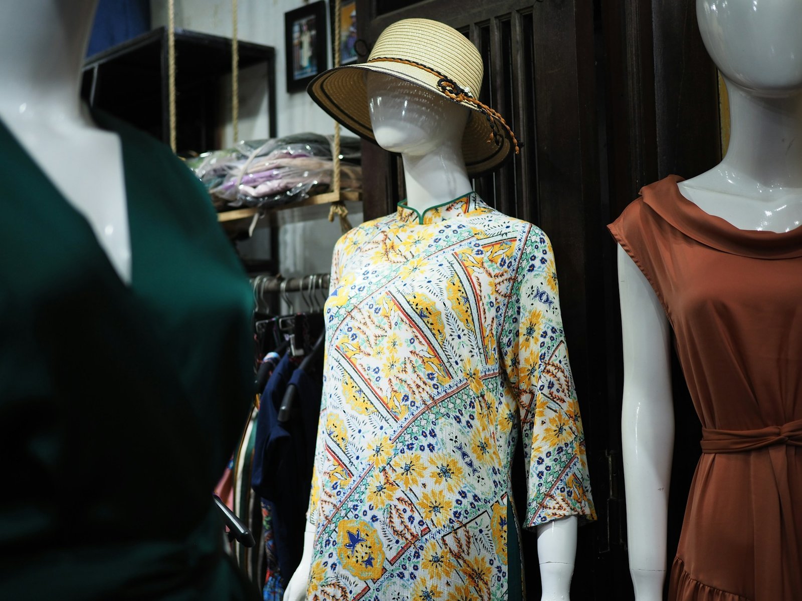 Vintage clothing display with hat